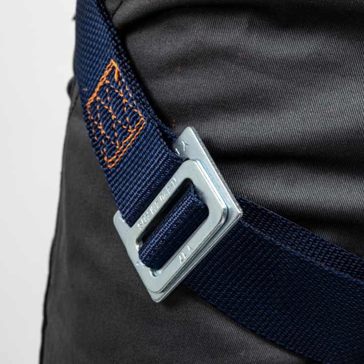 5 male-female metal adjustment buckles at the thighs, shoulders, and chest strap